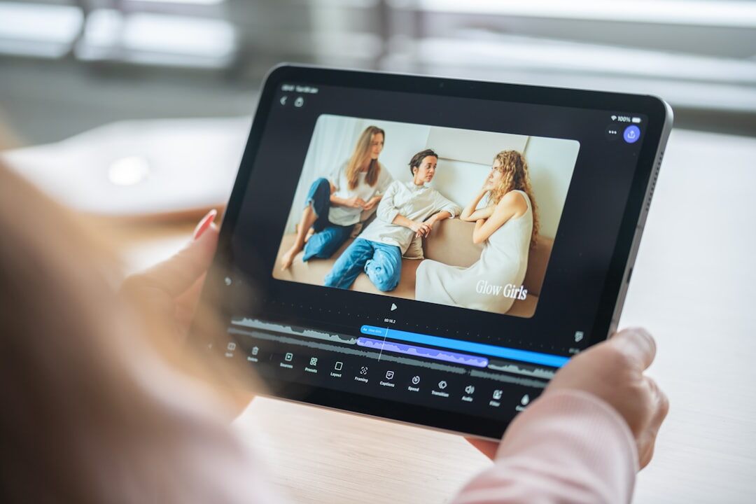 Team reviewing video footage on a tablet