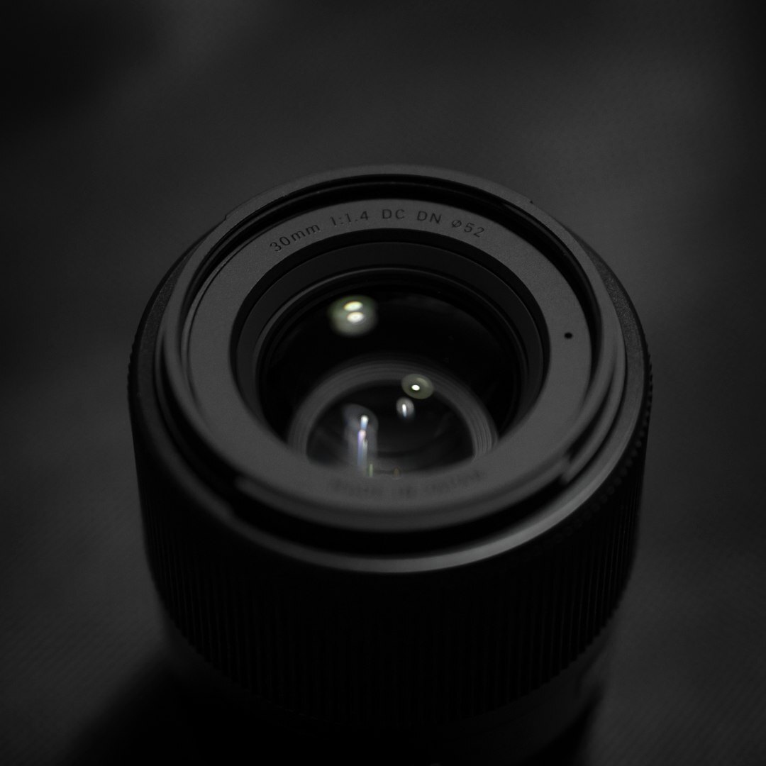 Close-up of a professional video camera lens