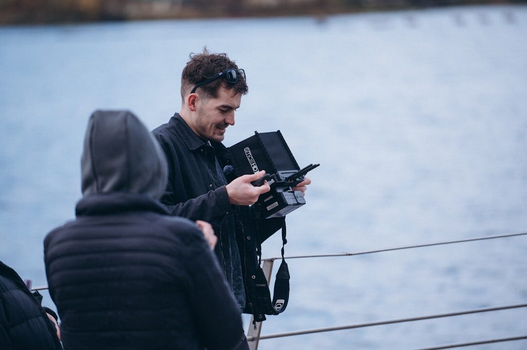 Camera crew filming a report outdoors